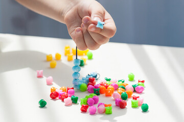 Kids activity to promote development, motor skills, thinking, coordination.