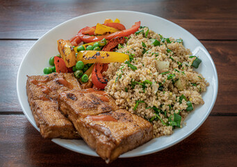 Vegan - vegetarian - homemade dish with couscous, grilled tofu and vegetables