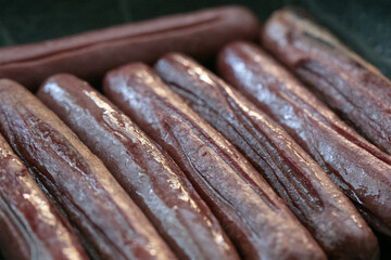 Close-up view of fried sausages. Meat fish. Cooking food. High quality photo