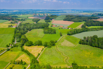 Aerial view from the drone of landscape of the German countryside. Agricultural fields, villages,...