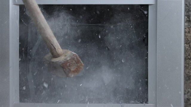 Breaking The TV With A Sledgehammer