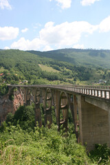 Fototapeta na wymiar Djurdjevica Tara Bridge is a concrete arch bridge over the Tara River in northern Montenegro