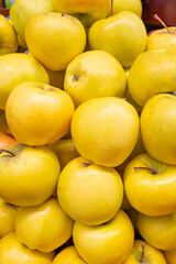 Fresh ripe apples on the counter of a farm shop
