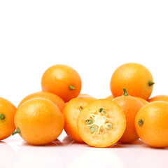 kumquat on white background