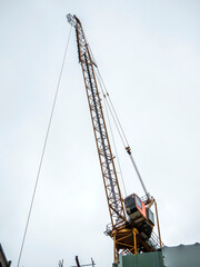 Fototapeta na wymiar Tower crane on a construction site