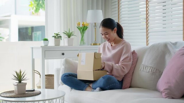 Close-up hand asia woman people work in small sme coffee caf&eacute; shop store owner use cashless wifi paywave nfc scan app smart pos reader sale in take out food drink order in urban city life contactless.