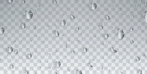 Water drops on a transparent background. Realistic vector image of splashing liquid on glass.