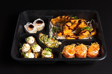 breaded fried fish and varieties in packaging for Japanese food delivery in Brazil