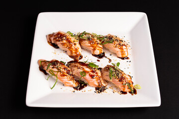 dish decorated with grilled salmon Japanese food in Brazil