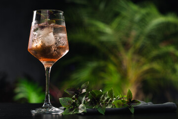 refreshing bar drink rosato mio made with ramazzotti, basil and ice