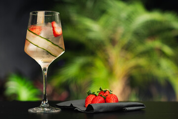 refreshing bar drink Lillet Vive made with strawberry, cucumber and ice - obrazy, fototapety, plakaty