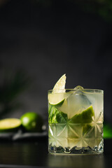 Brazilian caipirinha drink with cachaça, lemon, sugar and ice