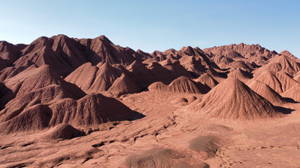 Panoramic view of red mountains and blue sky. Rocky Mountains. tourist banner design