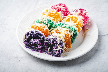 Pinoy Merienda- Colorful Pichi-pichi, also spelled pitsi-pitsi, is a Filipino dessert made from...