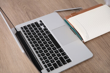 Notebook and computer on the table