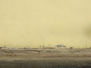 aged street yellow wall background