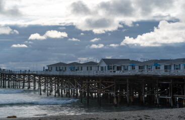 Obraz premium Stormy sunset at Crystal Pier, Pacific Beach