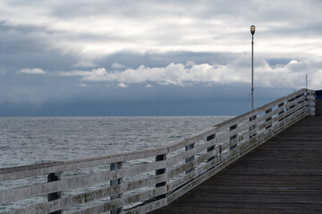Fototapeta premium Stormy sunset at Crystal Pier, Pacific Beach