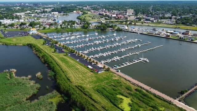 Oasis Marinas at Port Lorain marina in Lorain, Ohio on Lake Erie.  Aerial  drone footage.  With Lorain, Ohio in the background