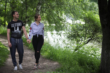 Fototapeta premium Beautiful young couple on a walk