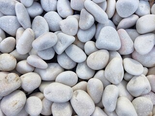Pebbles stone abstract background.