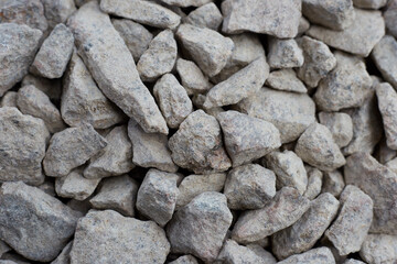 Crushed stone gray large stone for construction close-up, used for roads