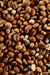 Mixture of raw and roasted coffee beans texture