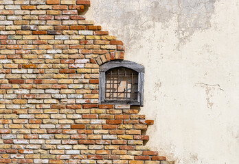 Panoramic old window with brick and white wall background with copy space.