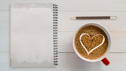 Top view of empty note with  heart sign coffee