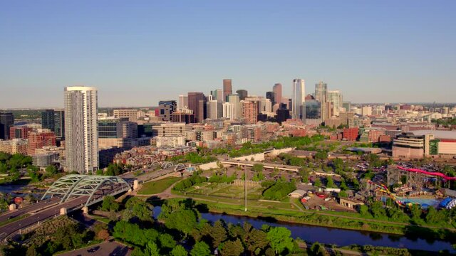 High-rise Apartment Building Of The Confluence On The Riverbank Of South Platte With Downtown Denver In Colorado, USA. - aerial