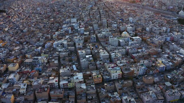 Aerial shot of the slum. sunset. 4K.
urban sprawl.