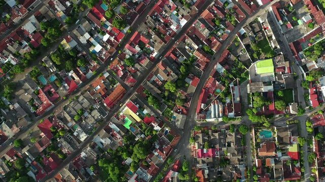 Top Down Aerial View of Honda Town, Tolima, Colombia, Colorful City Buildings on Golden Hour Sunlight, High Angle Drone Shot