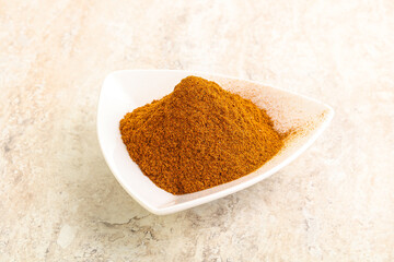 Dry Paprika powder in the bowl
