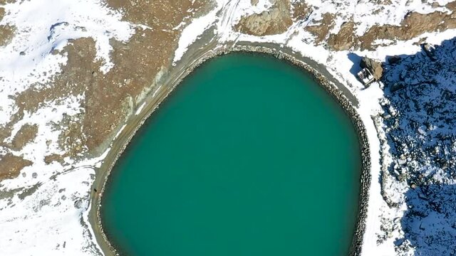 Turquoise lake  Valais Alps, Zermatt, Switzerland, Europe. Drone shot
