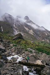 The woman trekking on the way to Annapurna base camp.