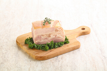 Cut of pork bacon over board