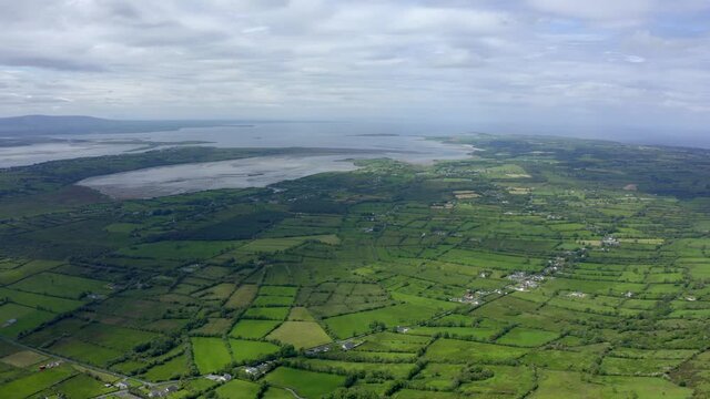 Sligo Bay, Ireland, June 2021. Drone slowly tracks south with a breathtaking view to the west of the Atlantic ocean with Strandhill, Coolera peninsula and the Knocknarea in the distance.