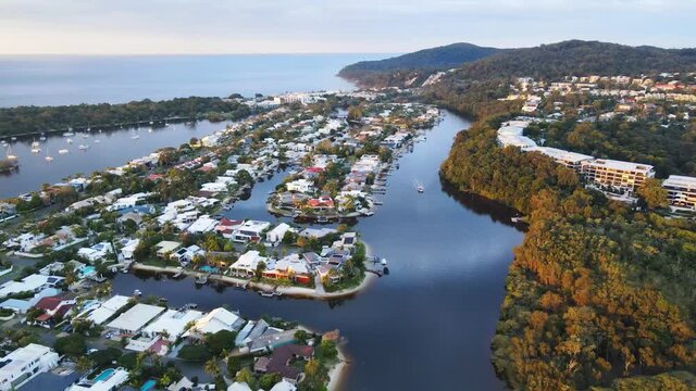 Panoramic View Of Holiday Homes At Noosaville At The Waterfront Of Noosa River In Queensland, Australia. aerial