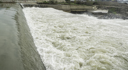 the water. cloudy water after floods. photo during the day.
