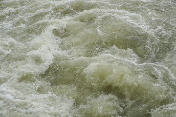 the water. cloudy water after floods. photo during the day.