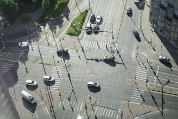 shadows. intersection photographed from above. aerial photography. car traffic at an intersection...