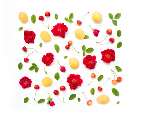 Flat lay, copy space. Summer composition with  berries sweet cherry, apricots, peaches on a beige background.