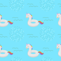 Beautiful seamless tropical pattern with Inflatable circle in the shape of a unicorn on a blue background. Abstract summer texture. Design for fabric, wallpaper, textile and decor.
