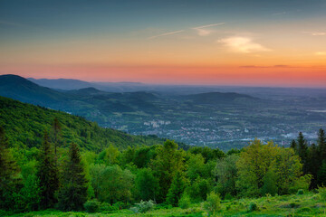 Naklejka na ściany i meble Amazing sunset from the Rownica peak with the Silesian Beskids view. Poland