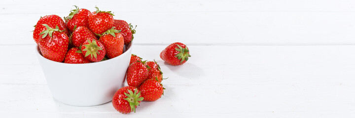 Strawberries berries fruits strawberry berry fruit in a bowl on wooden board panoramic view...
