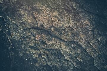 Stone background. Beautiful brown-gray texture of a large stone in the mountains.