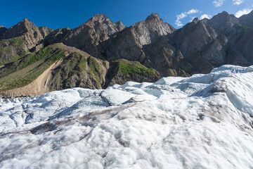 Fototapeta na wymiar Passu Glacier in Patundas trek surrounded by Karakoram mountains range, Gilgit Baltistan north Pakistan