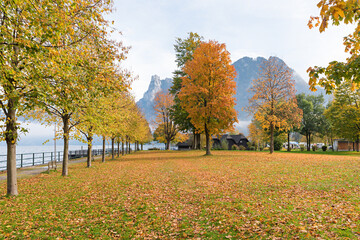 idyllic autumnal lake shore scenery at tourist resort Ebensee, lake Traunsee, Salzkammergut