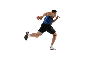 Caucasian professional male athlete, runner training isolated on white studio background. Muscular, sportive man. Concept of action, motion, youth, healthy lifestyle. Copyspace for ad.