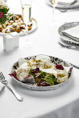 Traditional italian appetizer vitello tonato thinly sliced pieces of marinated veal light background, copyspace